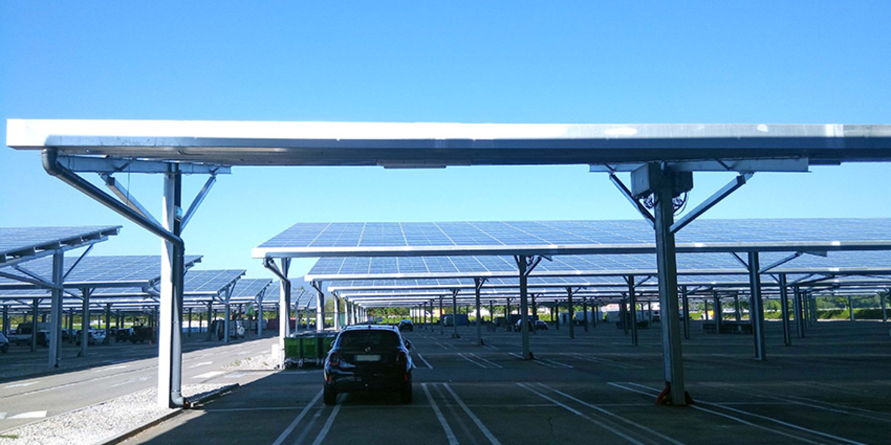 ombrieres-de-parking-photovoltaique-references-Cora Colmar-bandeau